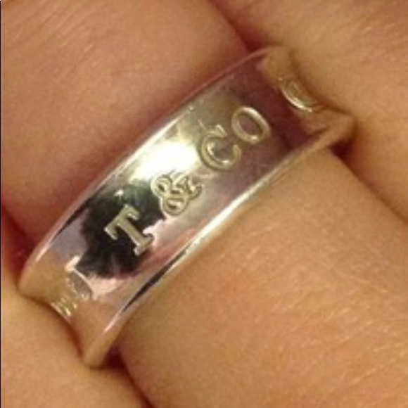 Tiffany & Co. Jewelry - Tiffany&co signature wide sterling ring w pouch